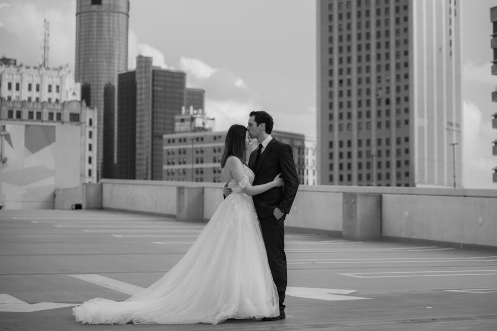 Romantic couple photo taken at a beautiful wedding venue in Detroit Michigan. Be relaxed like that in your wedding after you know what to look for in a wedding photography contract!