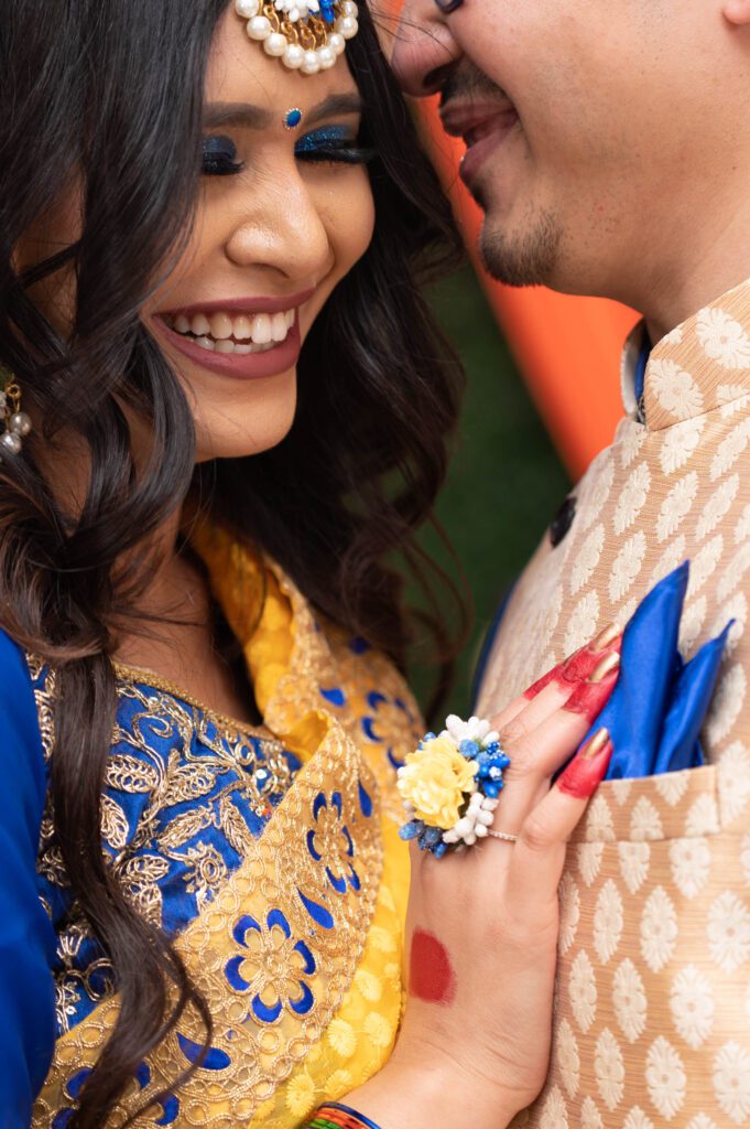 Image of the couple in a haldi ceremony