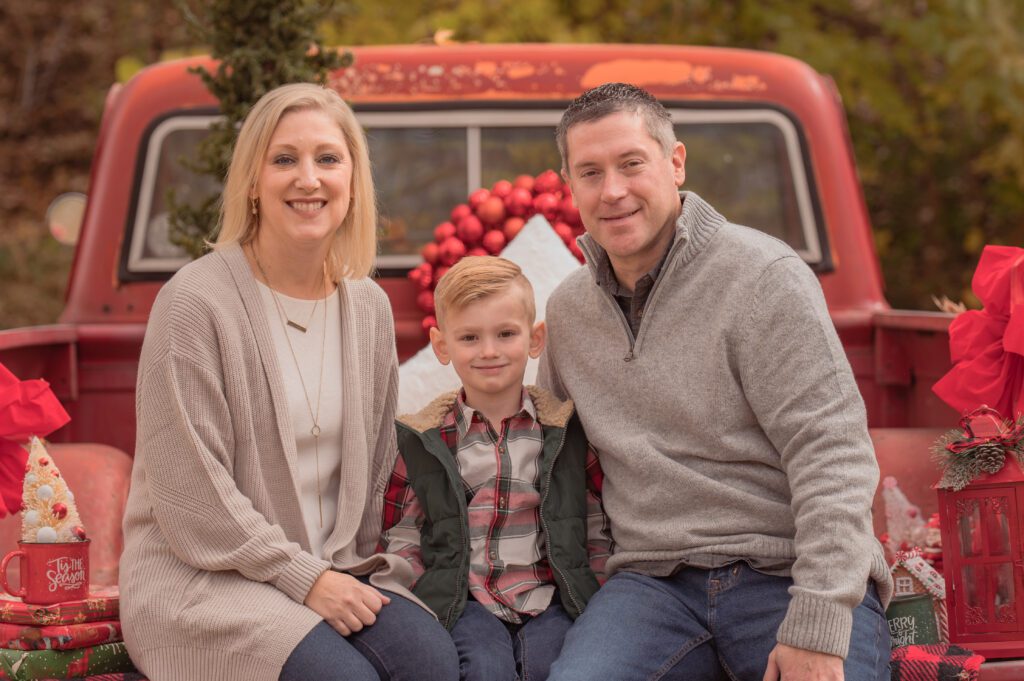 Christmas Family Photo on a Red Truck Session. 